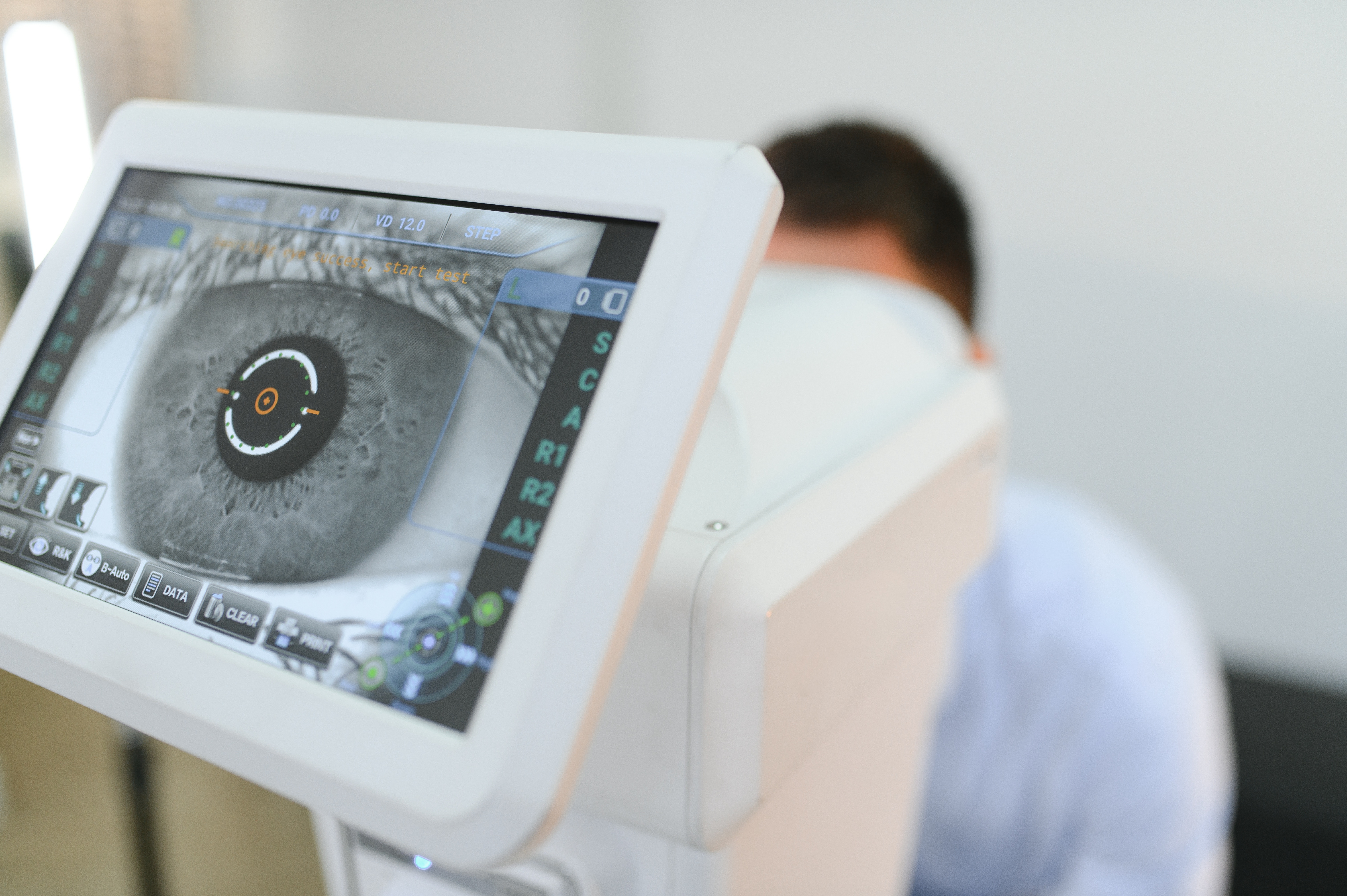 A patient having their eyes checked at a clinic